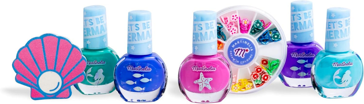 Esmaltes Martinelia en tonos marinos, lima de concha y rueda de decoraciones