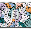 Calendario de pared Mooving 2026 con portada floral y anillado metálico