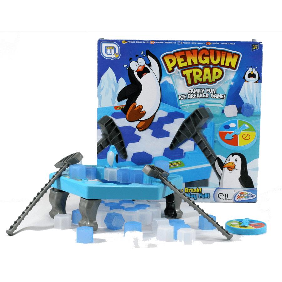 Juego Trampa del pingüino armado con bloques de hielo, martillos y ruleta junto a su caja