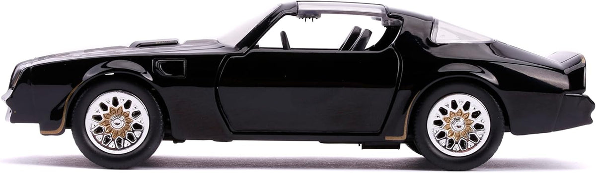 Vista lateral del Pontiac Firebird negro escala 1:32