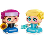 Mini Anna con girasol y mini Elsa con rayo de hielo armadas en LEGO