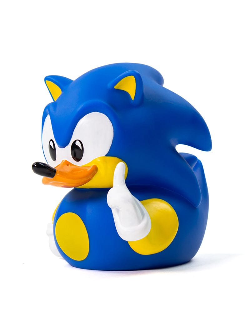 Pato Sonic azul fuera de la caja señalando con el dedo