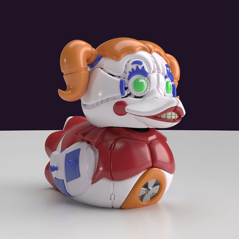 Mini Tubbz Circus Baby de perfil con traje de payaso rojo