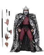 Figura Shredder NECA escala 1/4 con capa, lanza, cuchillo y manos intercambiables
