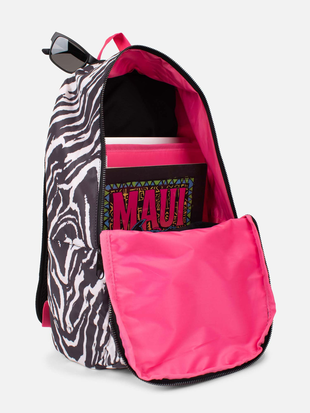 Mochila estampado cebra Maui and Sons abierta con forro interior fucsia