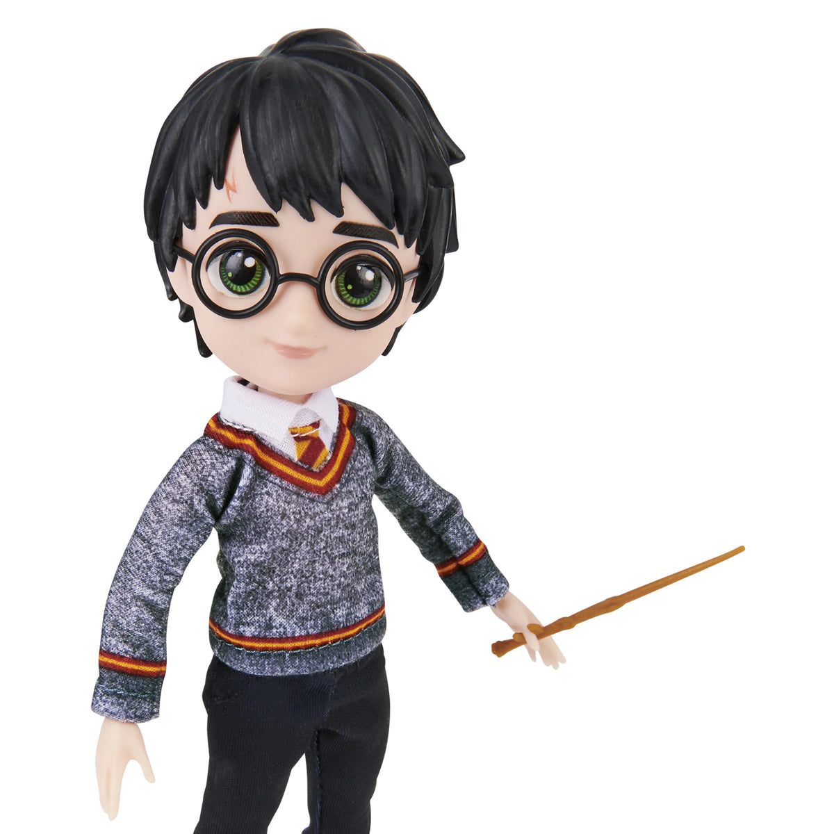 Primer plano del muñeco Harry Potter con lentes redondos, cicatriz y varita