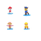 Mini figuras de Marshall, Chase, Skye y Rubble sobre base celeste, vista frontal