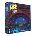 Caja de la expansión Paris Eiffel de Devir con la Torre Eiffel iluminada de noche