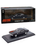 Plymouth Cuda negro de John Wick 4 escala 1:43 junto a su caja Greenlight