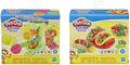 Cajas de los dos modelos del surtido Play-Doh Kitchen Creations: exprimidor de frutas y tacos
