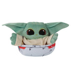 Peluche Grogu sentado dentro de su hover-pram de tela