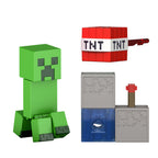 Figura Minecraft Creeper junto a su bloque de TNT y pieza Redstone