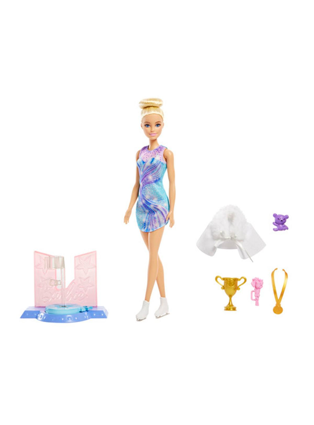 Barbie patinadora junto a su base, chaqueta, trofeo y medalla