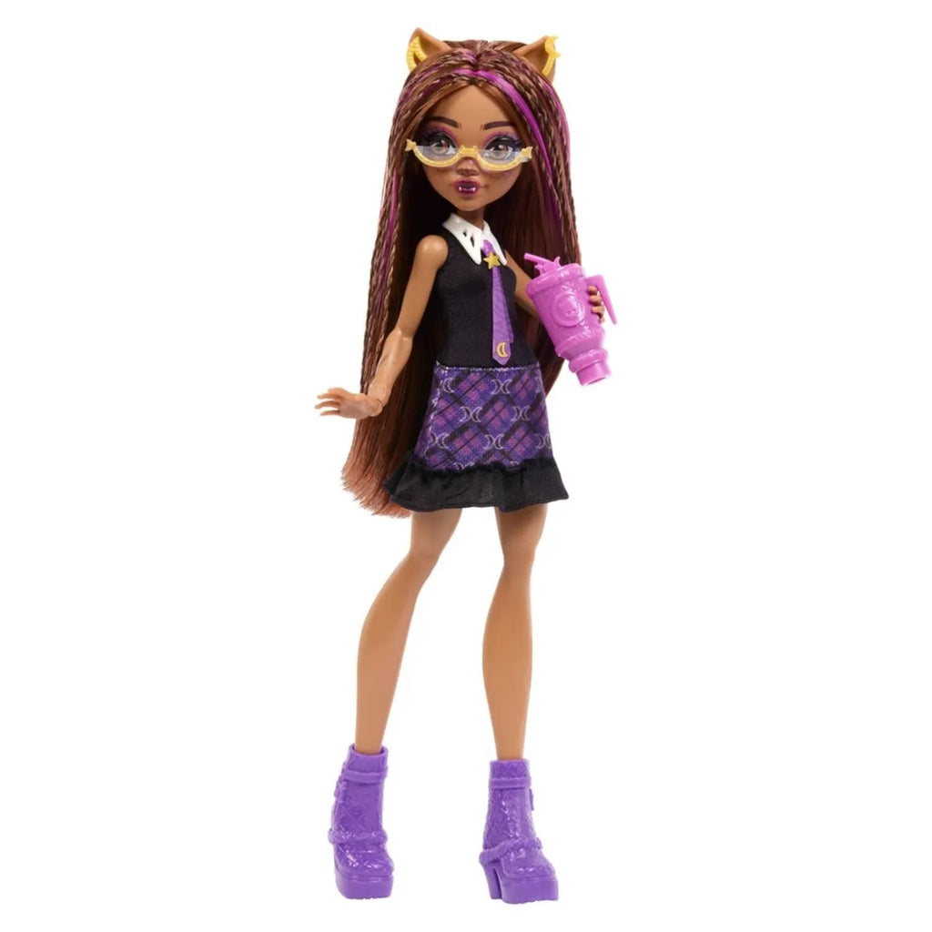 Muñeca Monster High Clawdeen Wolf con uniforme negro y morado, gafas y bebida