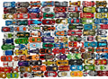 Decenas de autos Hot Wheels básicos de distintos modelos y colores que muestran el surtido
