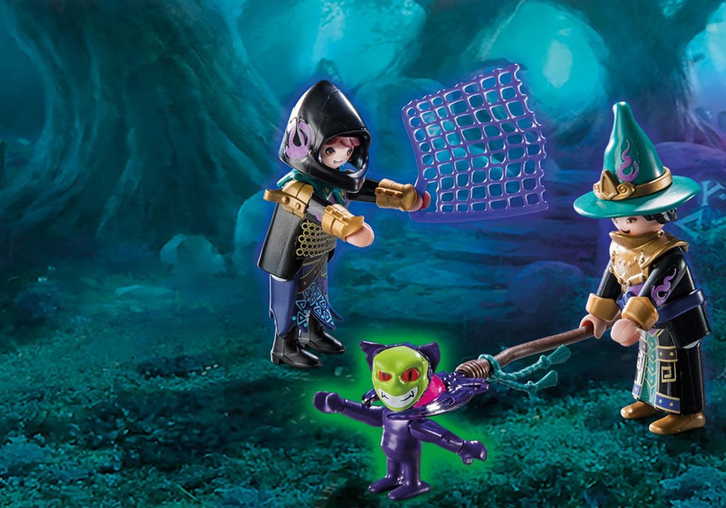 Magos de Violet Vale lanzan una red para atrapar al pequeño demonio verde