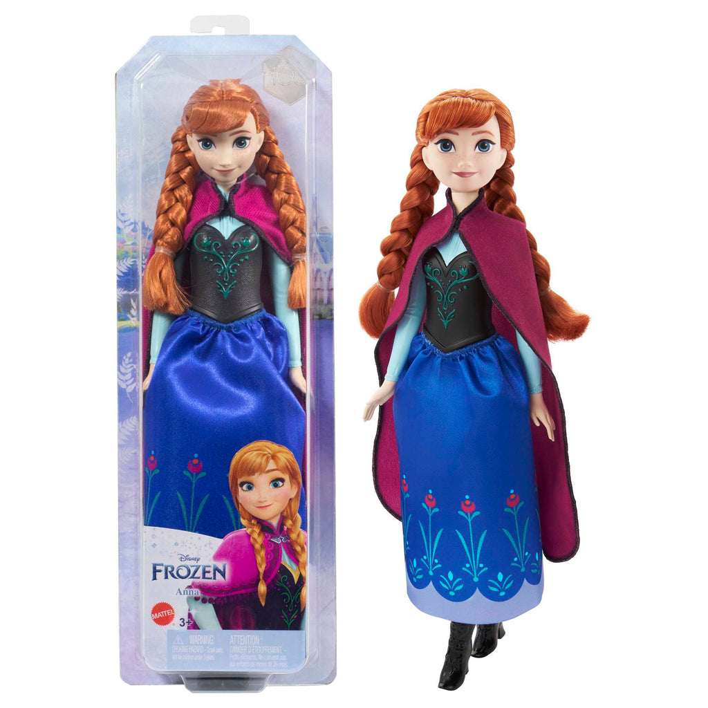 Muñeca Anna de Frozen con capa magenta junto a su caja
