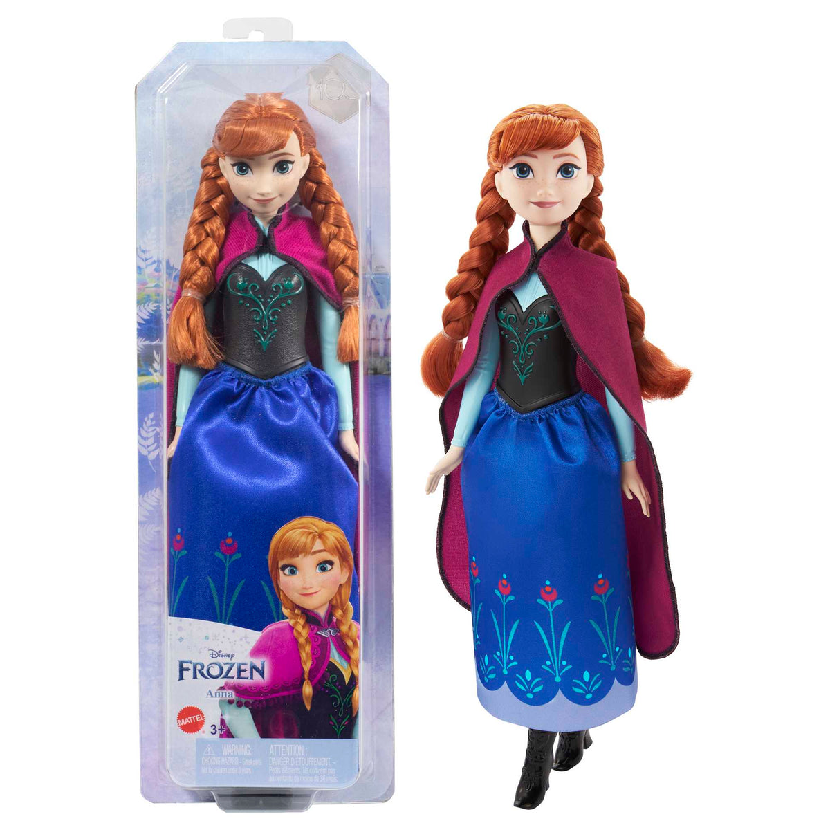 Muñeca Anna de Frozen con capa magenta junto a su caja